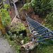 EAAV repara tubería del acueducto rota en puente del barrio El Buque